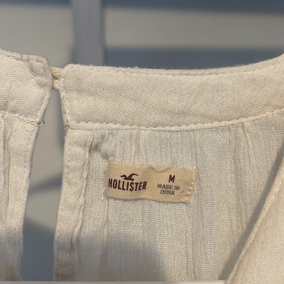 Cream off-shoulder long sleeve w tribal print, high neck - Picture 2 of 4